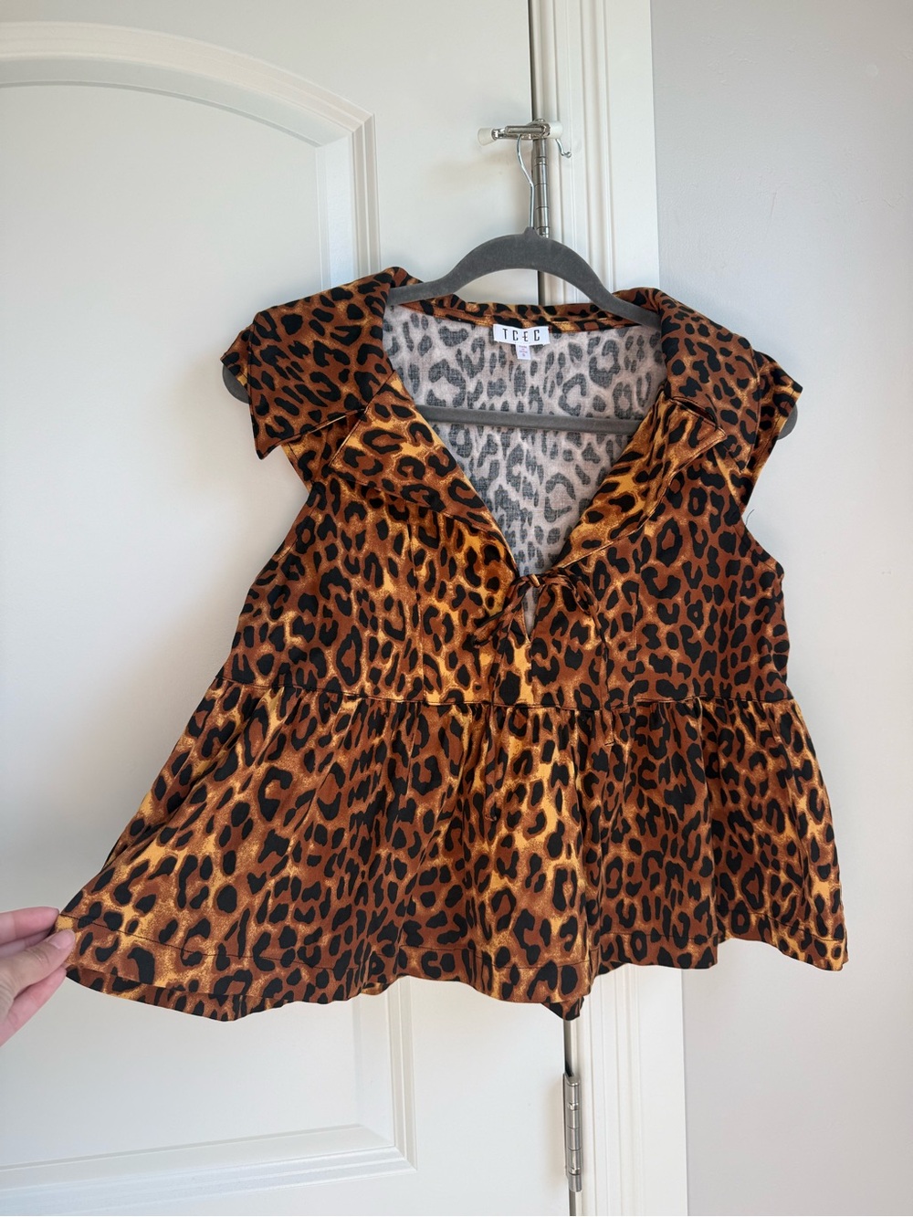 TCEC Leopard Print Ruffled V-Neck Blouse in Brown and Black